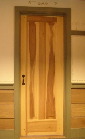 Woodwork/The Sweetgrass Joinery Co. -Interior Greek Revival style door in native yellow-poplar