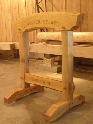 Woodwork/The Sweetgrass Joinery Co. - Framed sign stand in native cherry with hand-carved inscriptions.