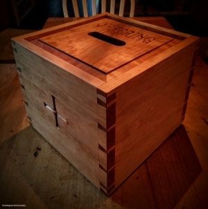 Woodwork/The Sweetgrass Joinery Co. - Offering box in native cherry with handcut dovetails and handcarved lettering.